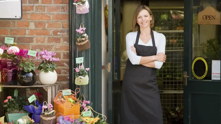 Florist owner outside her shop