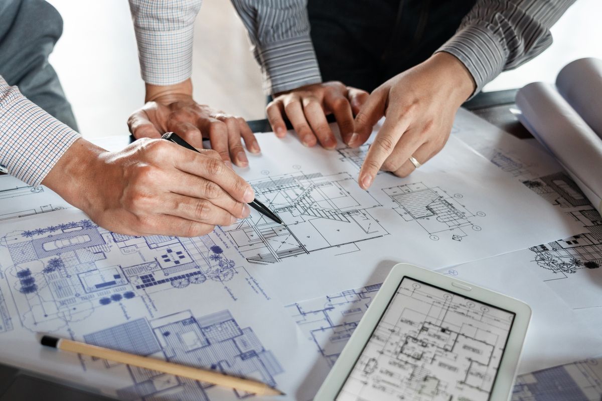 Architect drawing plans