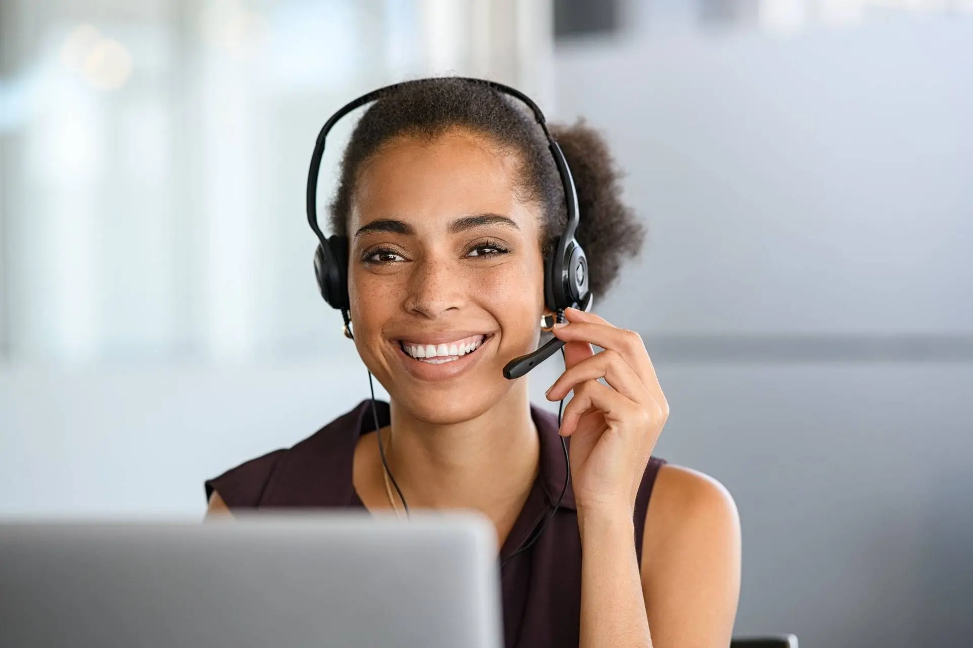 Business owner receiving call updates from AI receptionist system